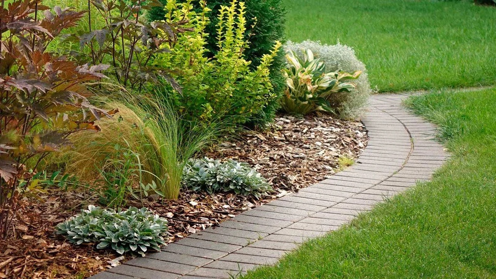 Garden with water feature and natural rockery